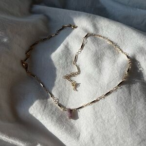 Anthropologie Amethyst necklace with moon detailing in back, on gold chain